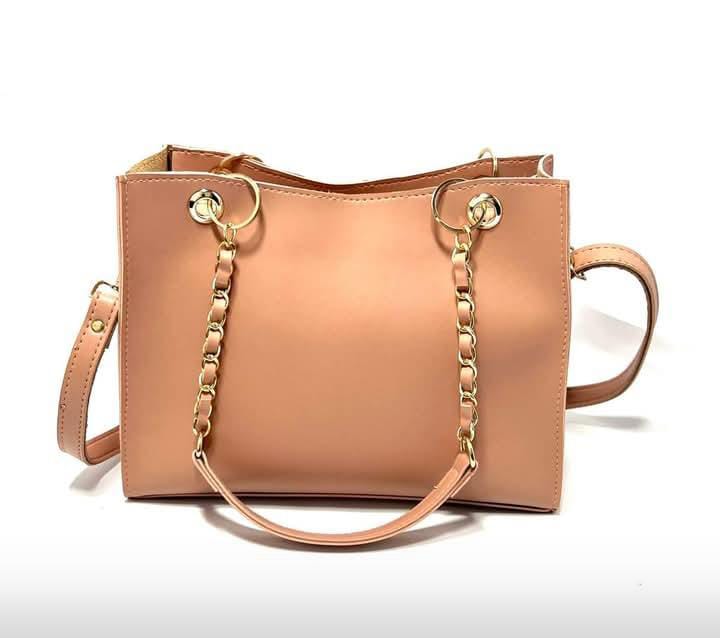 Peach trapeze top-hand bag